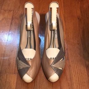 Gorgeous taupe leather sling backs made in Italy. Never worn! Size 40 1/2 size 9